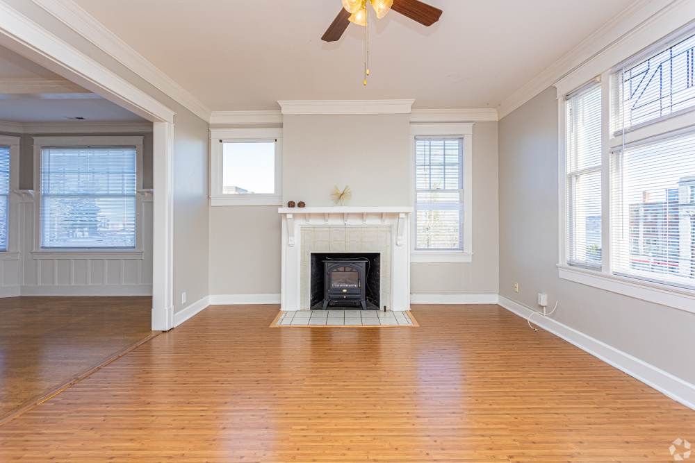 Living room with fireplace at The Miller in Tacoma, Washington