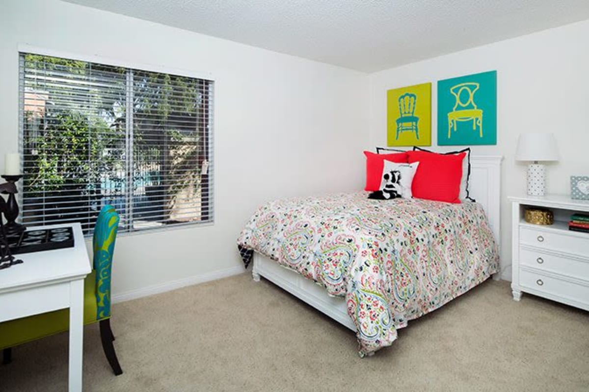 A bedroom with large window at River Ranch, Simi Valley, California