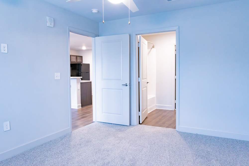 Unfurnished bedroom with carpet flooring at Villas At Mount Zion in Stockbridge, Georgia
