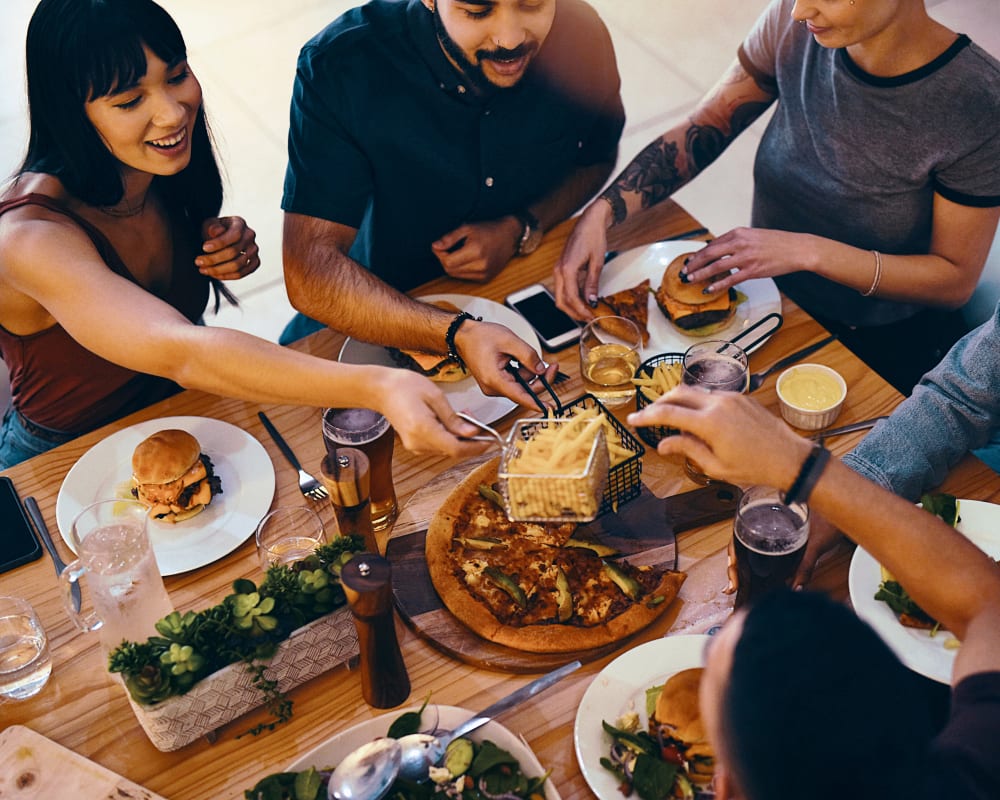 residents enjoying dinner together outside at The Overlook at Fountaingrove in Santa Rosa, California