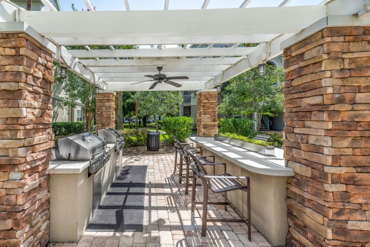 Amazing outdoor grilling area near the pool in Jacksonville, Florida near Eddison at Deerwood Park