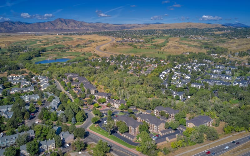 An aerial view of the property at The Crossings at Bear Creek Apartments in Lakewood, Colorado