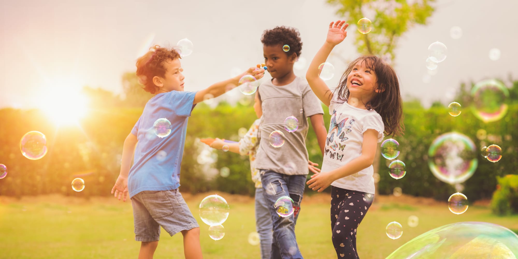 Resident kids playing outside at The Colony Uptown in San Antonio, Texas