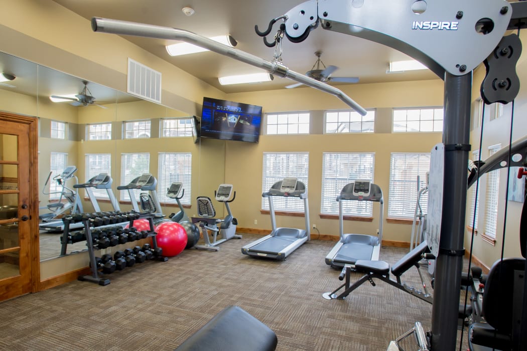 Fully equipped fitness center at Portofino Apartments in Wichita, Kansas