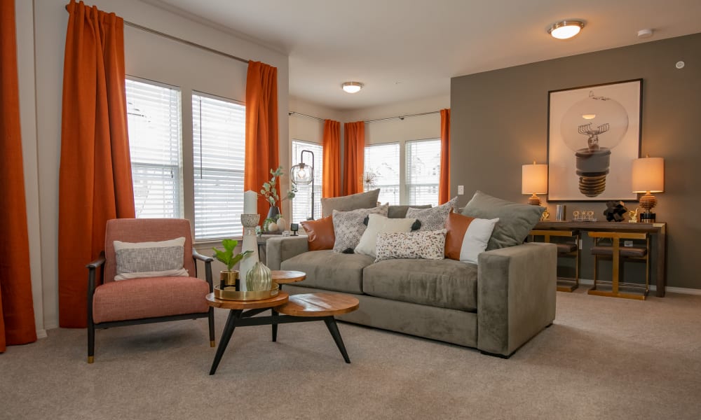 Model living room with open floor plan at Cedar Ridge in Tulsa, Oklahoma