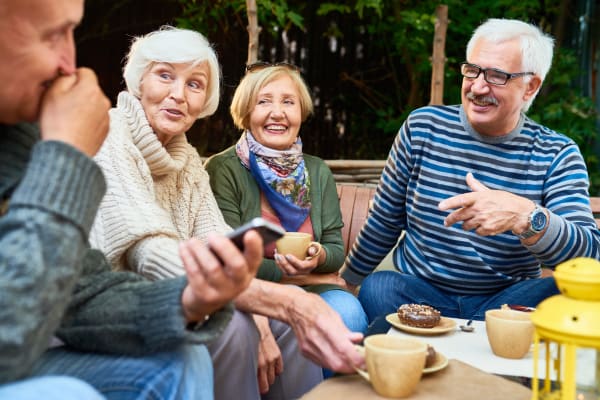 A group of residents talking at Randall Residence of West Milton in West Milton, Ohio