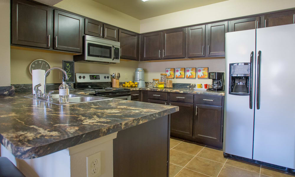 Kitchen at Mission Point Apartments in Moore, Oklahoma