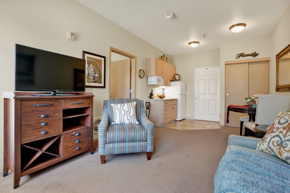 Living room in senior living apartment at The Commons on Thornton in Stockton, California