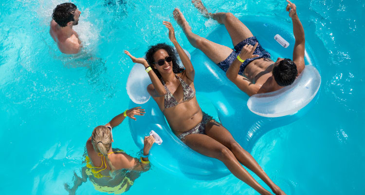 Family enjoying the pool at Las Casas at Windrose in Litchfield Park, Arizona