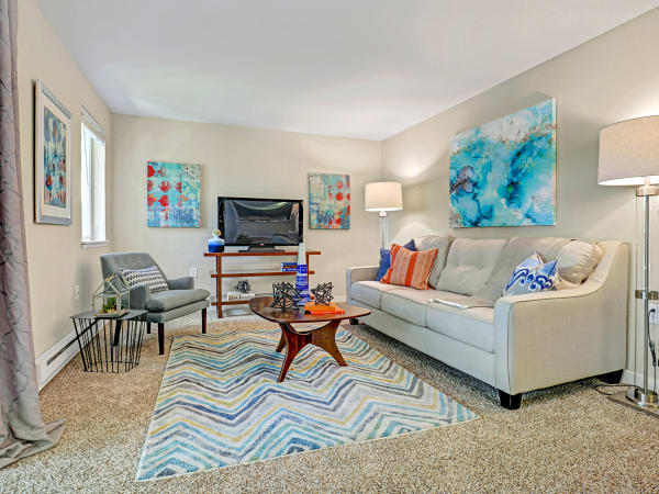 A fully furnished living room at Cascade Ridge in Silverdale, Washington