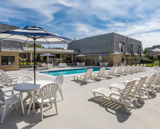 Resort-style swimming pool at Hilton Village II in Hilton, New York