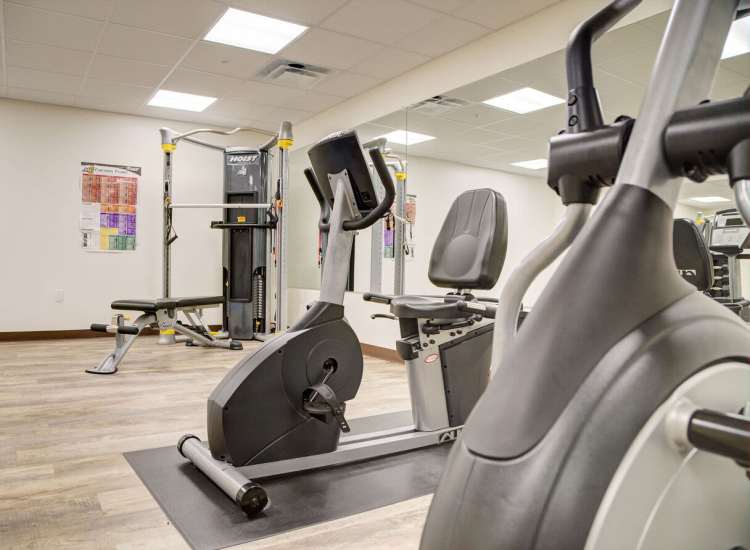 Well-equipped fitness center at The Residences at Lincoln Park in Dartmouth, Massachusetts