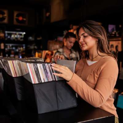 Woman searching books at The Marling in Madison, Wisconsin