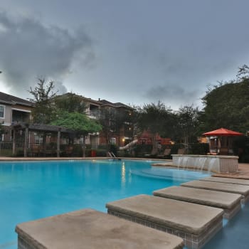 The sparkling community swimming pool at Cypress Creek at Lakeline in Cedar Park, Texas