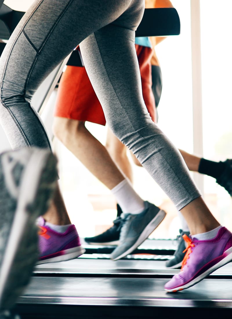 Residents running on treadmills near Houston, Texas from Marquis at Westchase