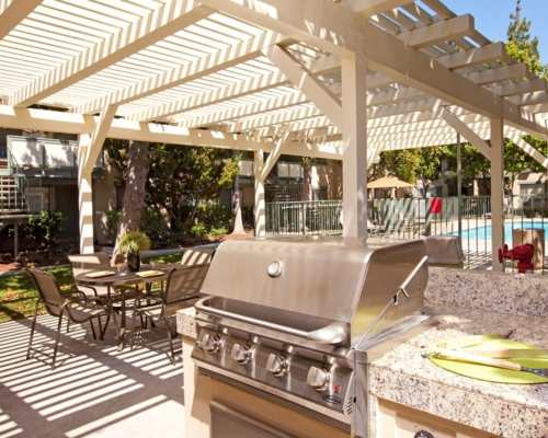 Patio with barbeque area at Pebble Creek Apartment Homes, Campbell, California