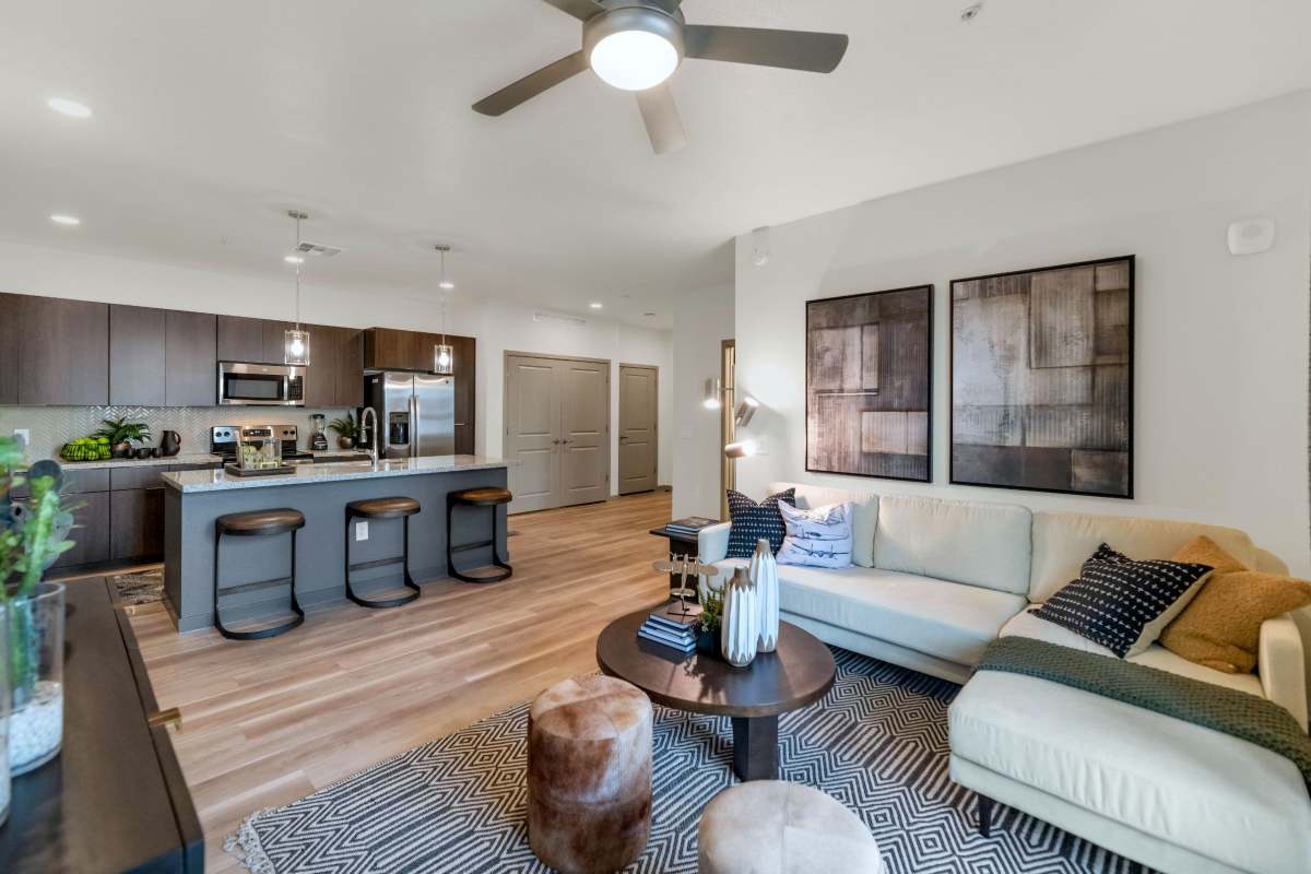 Spacious model apartment with wood-style flooring at Hangar at Thunderbird, Glendale, Arizona