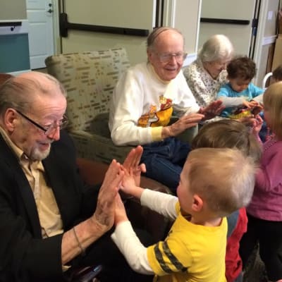 Residents and kids playing games at Ebenezer Ridges Campus in Burnsville, Minnesota