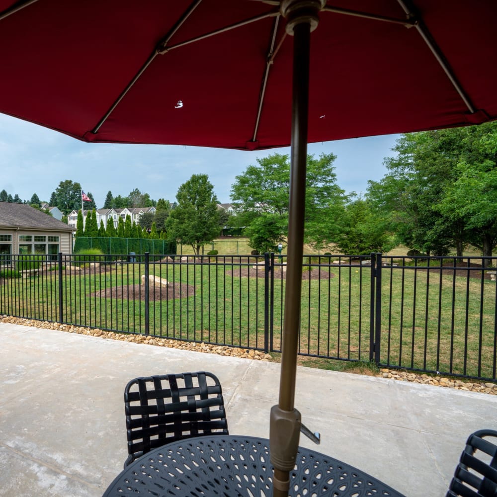 Table with chairs and umbrella at Hawthorne Community, Oakdale, Pennsylvania