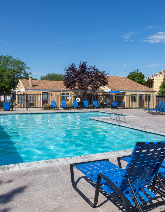 pool view with poolside lounge chairs at Callaway Apartments in Taylorsville