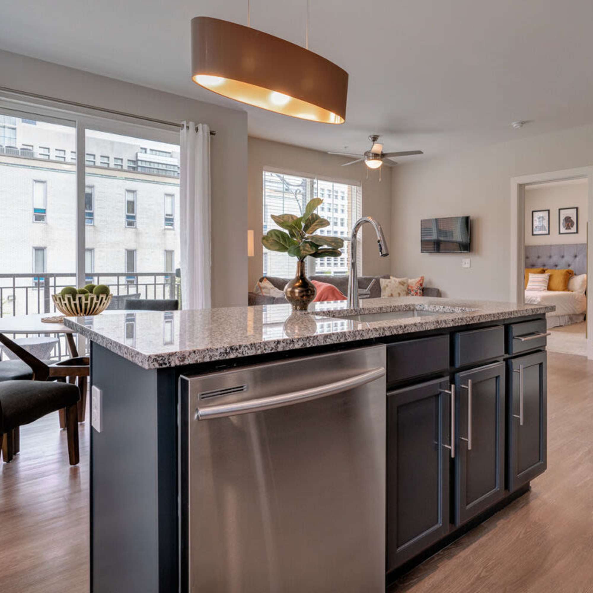 Open layout dining and living view from kitchen island at Xander on State in , Ohio