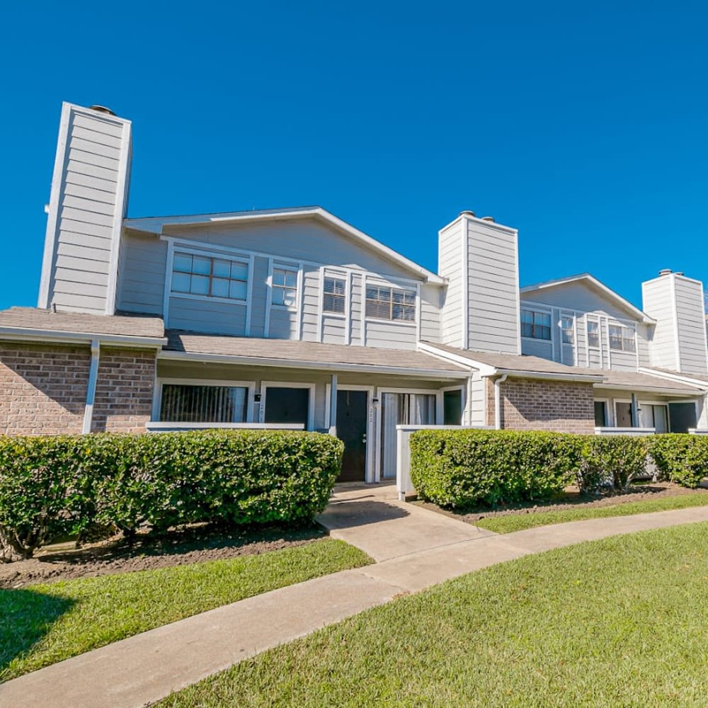Exterior view with green landscaping at Victoria Station in Victoria, Texas
