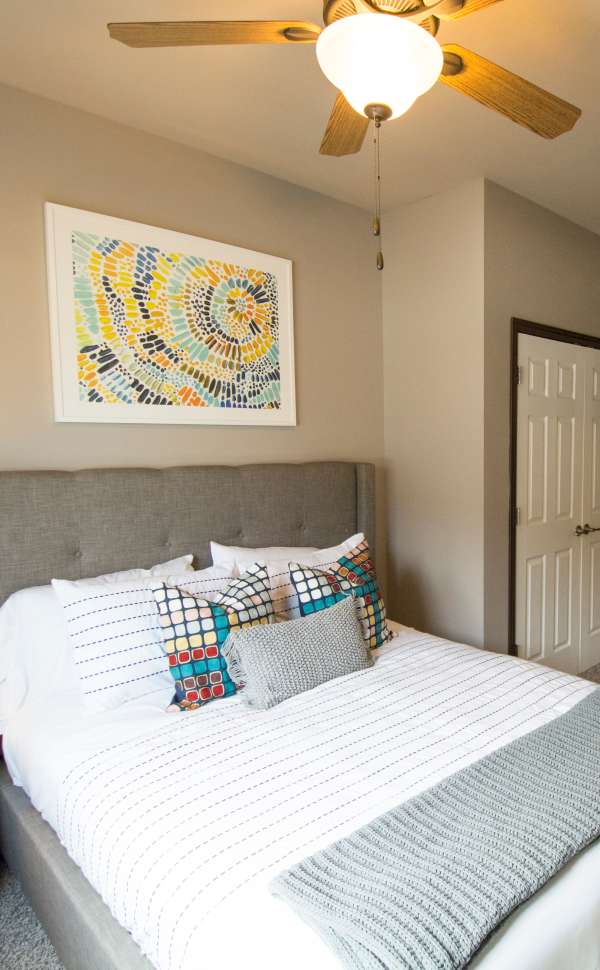Bedroom with a walk-in closet at Walnut Lake in Urbandale, Iowa