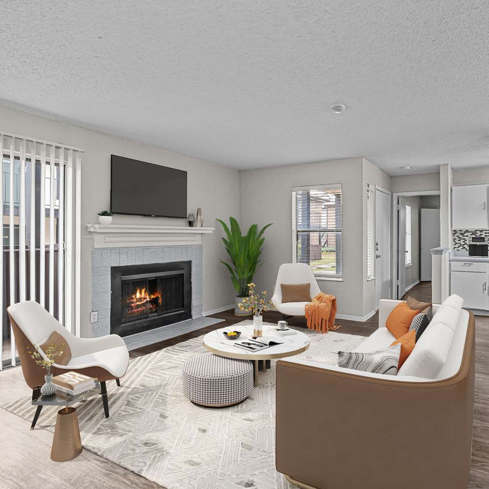 Well-furnished living area at Pine Oaks Apartments in Mesquite, Texas