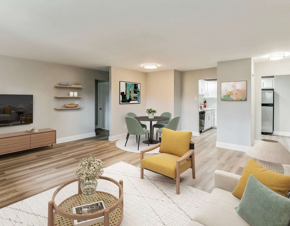 Living Room Area with television and wooden furniture at Eagle Rock Apartments at Malvern in Malvern, Pennsylvania