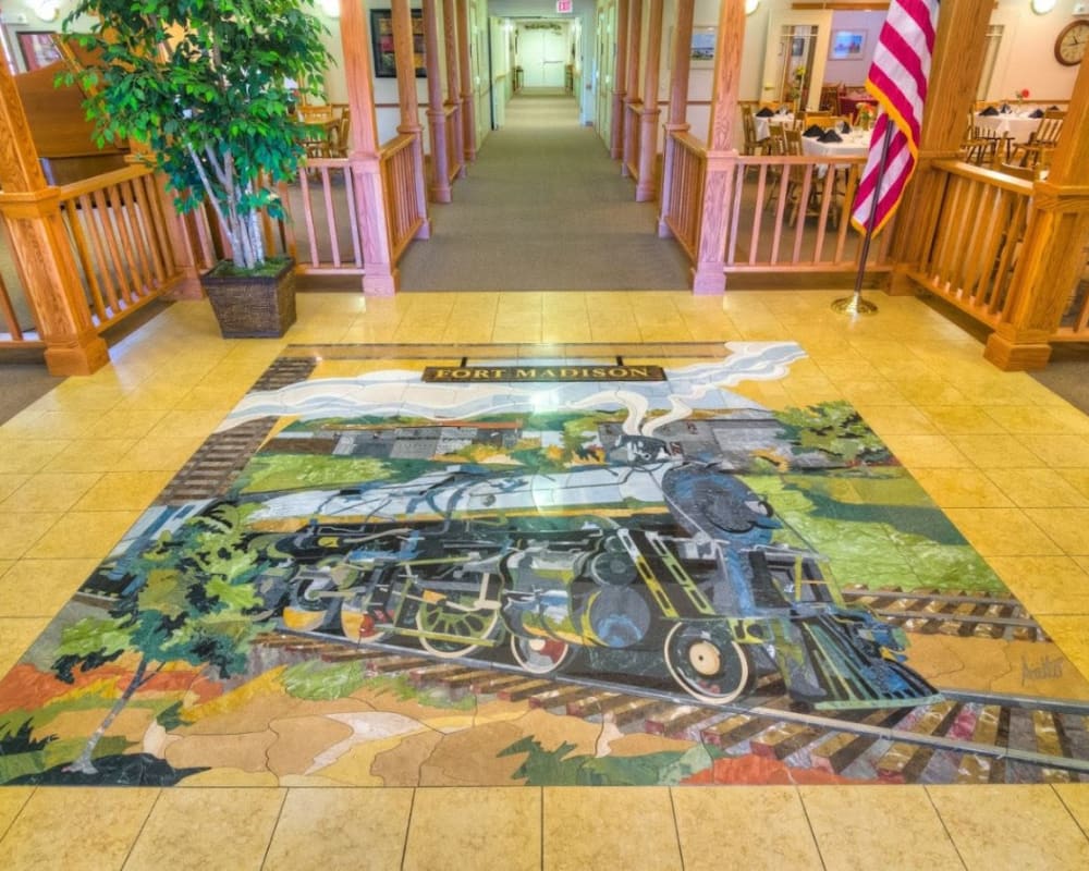 Closeup of the lobby's tile mosaic at Addington Place of Fort Madison in Fort Madison, Iowa