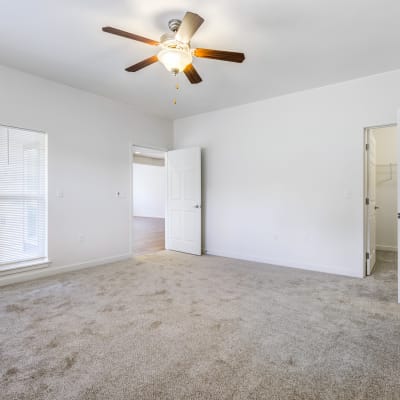 A spacious apartment bedroom at Meriwether Landing in Joint Base Lewis McChord, Washington