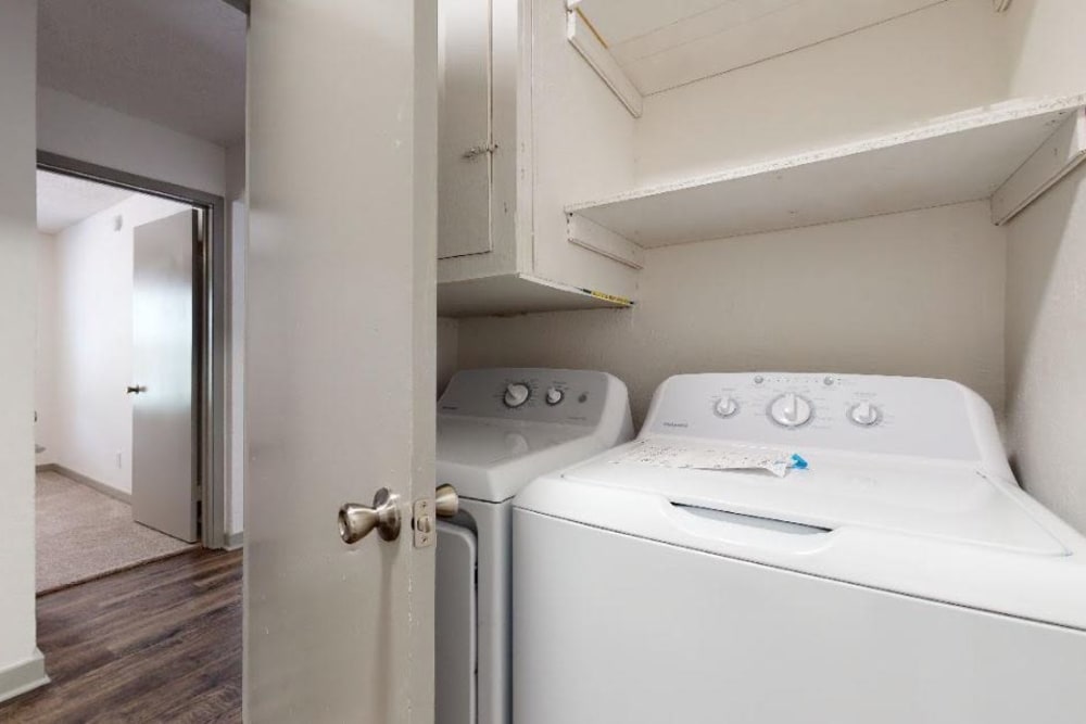 Washer and dryer in an apartment at The Haylie in Garland, Texas