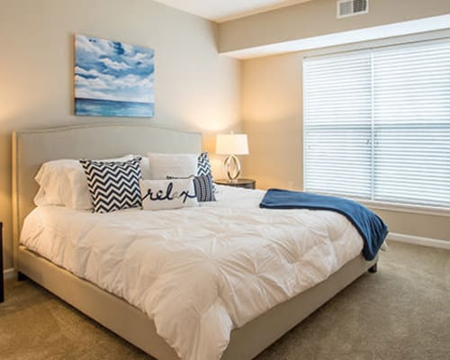 Bright master bedroom at The Landings at Meadowood in Baldwinsville, New York