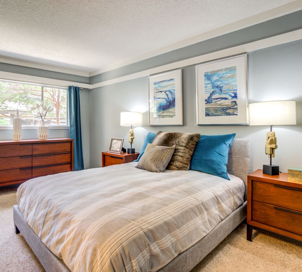 Plush carpeting and draped windows in a model home's bedroom at Sofi Fremont in Fremont, California