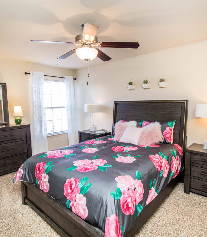 Spacious carpeted bedroom at Tuscany Place in Lubbock, Texas