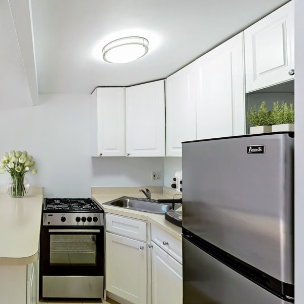 Luxury compact studio kitchen at 210-220 E. 22nd Street in New York, New York