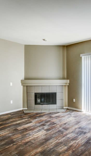 Living room with a fireplace at Fashion Terrace