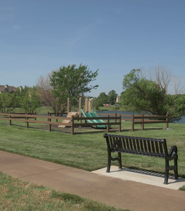 Walkway with bench at Newport Wichita in Wichita, Kansas