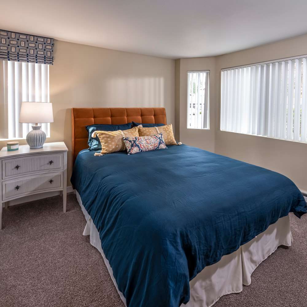 Bedroom in a model apartment at Redmond Place Apartments in Redmond, Washington