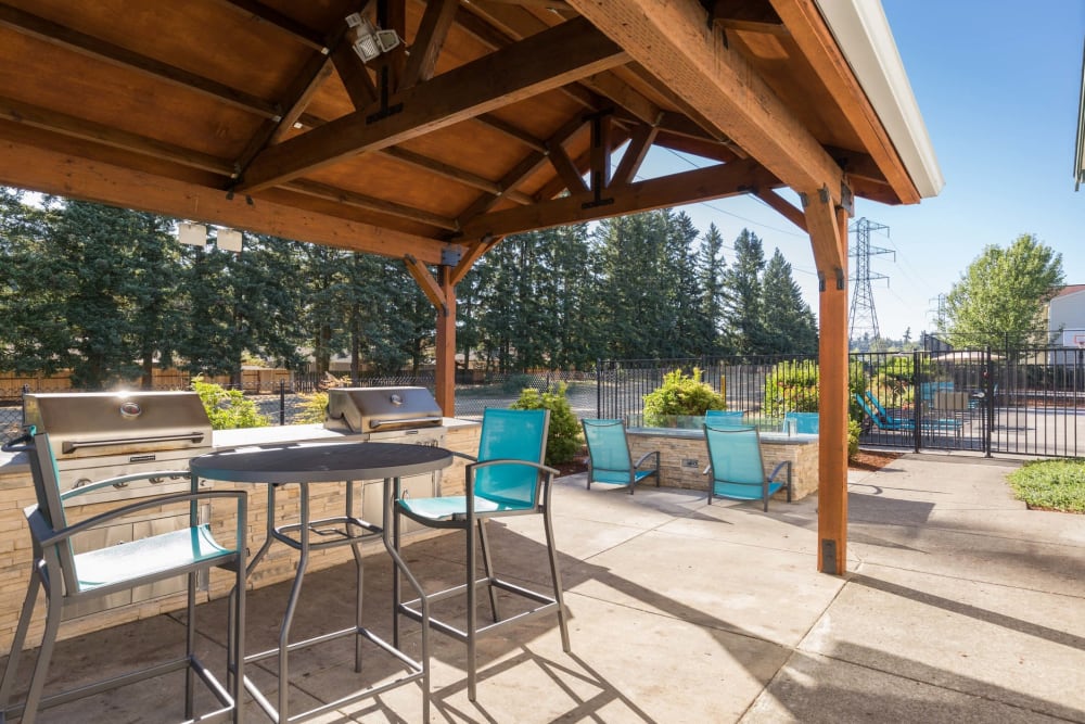 The outdoor covered barbecue area at The Landings at Morrison Apartments in Gresham, Oregon