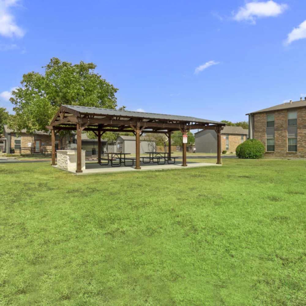 Outdoor grill with covered picnic area at Cleburne Plaza in Cleburne, Texas