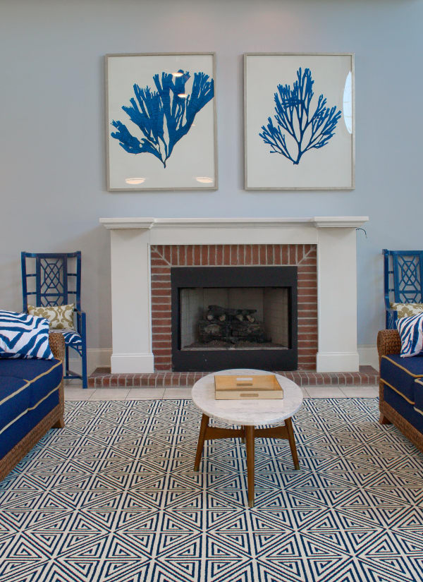 Fireplace between two couches at The Grove in Biloxi, Mississippi