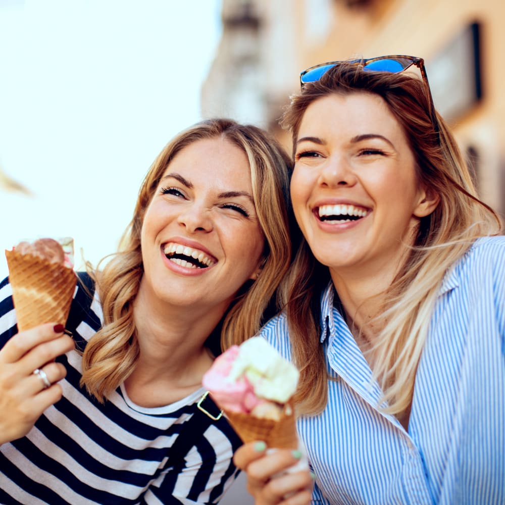 Friends enjoying ice cream near Town Center Apartments in Lafayette, California