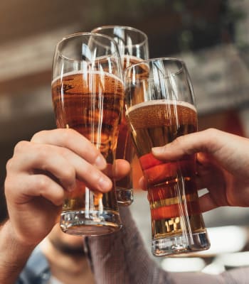 Residents enjoying beer near Slate Ridge at Fisher's Landing Apartment Homes in Vancouver, Washington