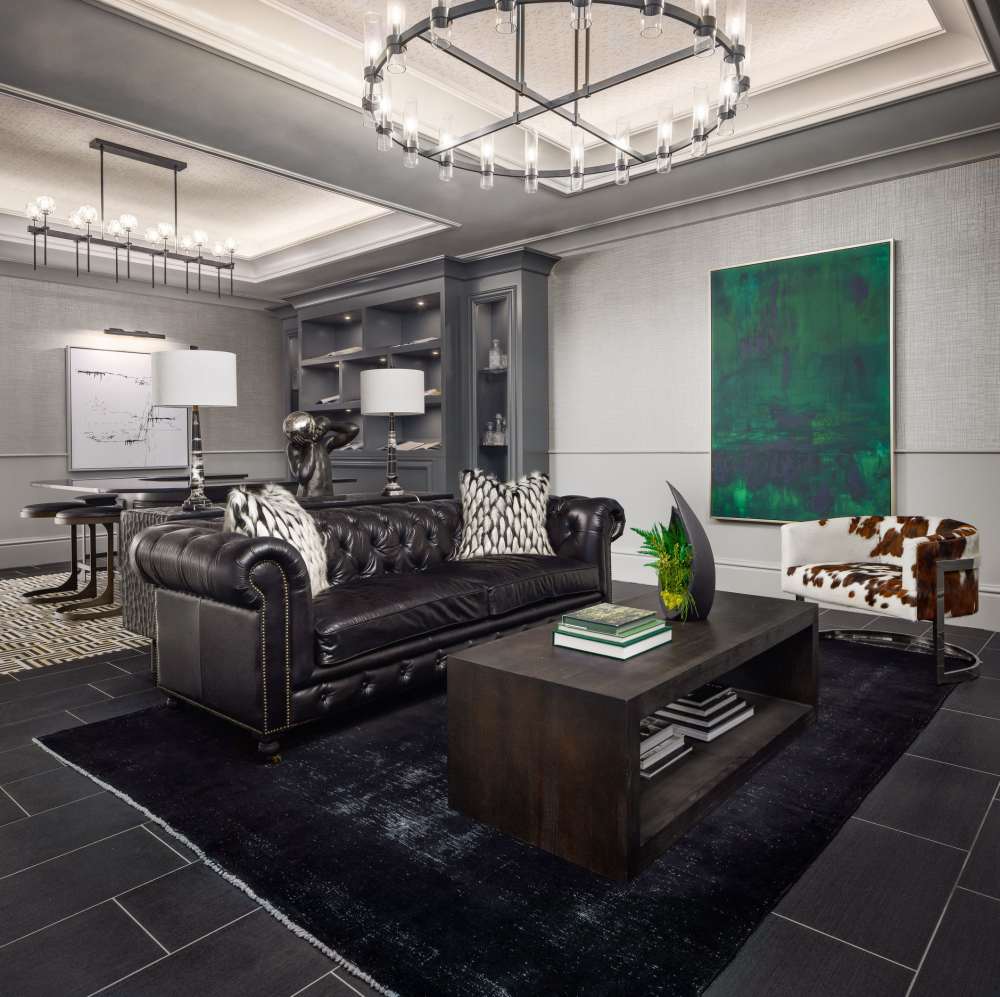 Chic lounge area with leather sofa at Novel Turtle Creek in Dallas, Texas