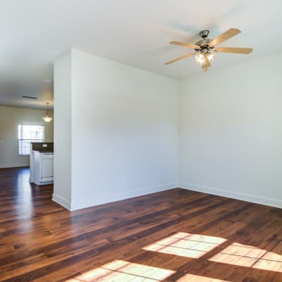 A living room with wood floors at Harborview in Oceanside, California