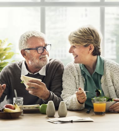 Couple having breakfast at Mirror Lake Village Senior Living Community in Federal Way, Washington.