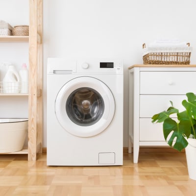 A washing machine in an apartment home at Mariposa at Bay Colony in Dickinson, Texas