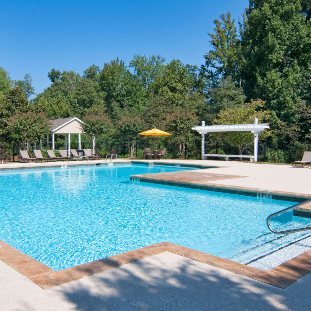 Large resident swimming pool at Amber Chase Apartment Homes in McDonough, Georgia