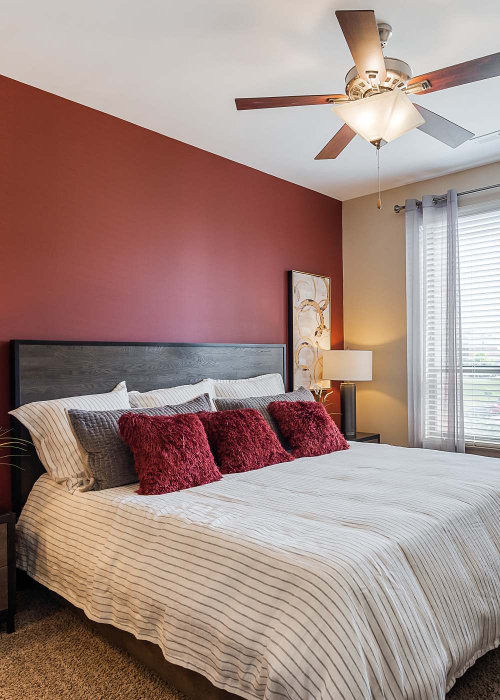 Bedroom with ceiling fan at Latitude at Deerfield Crossing in Mason, Ohio
